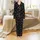 Family Group "Most Likely To" Christmas Pajamas: Festive Activity Pattern & Holiday Illustrations on Black Satin Pajamas Set - 2