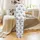 Thoughtful Gift: Minimalist Black Script 'Love' & Floral Line Art Pajamas - Seamless White Background Loungewear Satin Pajamas Set - 3