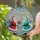 Holiday Celebrators' Vibrant Stained Glass Santas Gift Teal Red Gold Blue Snowflake Mosaic Art Stained Glass Suncatcher - GFWugj72af