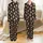 Sweet Style Enthusiasts' Charcoal Black Plush Caramel Bear Hearts Orange Flowers Seamless Pattern Satin Pajamas Set - 1