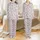 Women's Cute Simplified Cartoon Cow All-Over Pattern Pink Bows Lucky Black Text White Background Satin Pajamas Set - 1