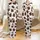 Pattern Lovers' Fluid Organic Dark Brown Cow Print Style on Crisp White Satin Pajamas Set - 1
