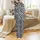 Animal Print Lovers' Bold Black White Cow Spot Pattern with Stylized Cow Heads and Milk Splashes Satin Pajamas Set - 3