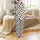 Whimsical Style Lovers' Black White Cow Spot Pattern with Cute Flat Cartoon Cows and Playful Brown "Moo" Text Satin Pajamas Set - 3