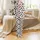 Whimsical Style Lovers' Black White Cow Spot Pattern with Cute Flat Cartoon Cows and Playful Brown "Moo" Text Satin Pajamas Set - 2