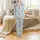 Capybara Lovers' Whimsical Cartoon Capybara Christmas Ice Skating Light Blue Seamless Pattern Satin Pajamas Set - 2
