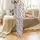 Cow Lovers' Whimsical Flat 2D Cartoon Cow Faces Soft Pink Snouts Orange Horns Organic Black Spots Pure White Pattern Satin Pajamas Set - 2
