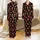 Western Christmas Lovers' Bold Red Gold Snowflake Cowboy Boots Santa Hats Star Repeating Pattern Satin Pajamas Set - 1
