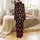Western Christmas Lovers' Bold Red Gold Snowflake Cowboy Boots Santa Hats Star Repeating Pattern Satin Pajamas Set - 3