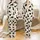 Cat Lovers' Whimsical Black Cat Seamless Pattern Playful Feline Warm Cream Peach-Orange Sky-Blue Accents Satin Pajamas Set - 1