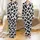 Modern Style Aficionados' Bold Jet Black & White Organic Cowhide Spot Pattern Satin Pajamas Set - 1