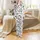 Curious Cartoon Cows: Happy Faces, Bold Black Spots, MOO Text - White Farm Pattern Satin Pajamas Set - 2