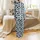 Dynamic Cow Print Design: Bold Black Organic Spots with Layered Vibrant Blue Shapes on White Satin Pajamas Set - 3