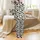 Organic High Contrast Black Shapes: Stylized Cow Profiles, Fence, & Terrain Pattern Satin Pajamas Set - 3