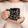 Personalized Mom Holding Hands Black Mug with Kids Names, Custom Floral Mother's Day Gift, 3D Effect Floral Coffee Cup for Mommy - 3