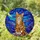 Smiling Tabby Cat Green Eyes Perched on Rocks Tiffany Glass Night Sky Moon Stars Stained Glass Suncatcher - 1