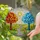 Winding Cobblestone Path Red Blue Trees Radiant Sun Wildflowers Layered Hills Jewel Tones Stained Glass Suncatcher - 2