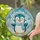 Smiling Cartoon Penguin Rosy Cheeks Light Blue Scarf Earmuffs Winter Snowflakes Gift Stained Glass Suncatcher - 2