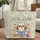 Fluffy Shih Tzu Dog Reading Floral Garden Storybook - Dog Lover Everyday Tote Quilted Tote Bag - 1