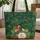 Red Macaw Green Frog Dense Fern Palm Foliage Winding River Floral Wreath - Wildlife Lover Gift Quilted Tote Bag - 1
