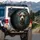 Cartoon Terrier Dog Head Brown Patchy Fur Blue-Green Eyes Dark Forest - Dog Lover Gift Spare Tire Cover - 3