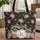 Raccoons Among Pink Roses Green Foliage Floral Wreath Wildlife Lover Gift Quilted Tote Bag - 1
