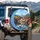 Italianate Village Mountain Lake Bell Tower Terracotta Roofs Flowering Trees - Travel Essentials Spare Tire Cover - 3