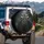 Cheerful Skeletons Steering Ghastly Ride - Macabre Enthusiast Gift for Car Owners Spare Tire Cover - 3