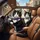 Tuxedo Cats Driving Luxurious Car European Street - Cat Lover Road Trip Gift Spare Tire Cover - 6