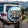 Miniature Schnauzers Driving Car Cityscape - Travel Essentials Dog Lover Gift Spare Tire Cover - 3