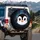 Wide-Eyed Cartoon Penguin Face, Snowflakes & Ice Crystals, Aurora Sky - Winter Lover Gift Spare Tire Cover - 3