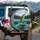 Largemouth Bass Leaping Lake Scene with Pine Trees - Fishing Enthusiast Gift for Fisherman Spare Tire Cover - 3