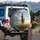 Woman Painter Divided Sky Grass Field - Home Decor Gift Spare Tire Cover - 3