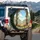 Lush Flower Garden Bright Blooms Stone Arches Blue Sky - Garden Lover Gift Spare Tire Cover - 3