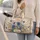 Cobalt Blue Daisy And Butterfly Floral Garden For Travel Getaways And Bridesmaids Quilted Weekend Bag - 2