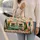 Retro Camper Cabin With Daisies And Evergreens For Camping Trips And Road Getaways Quilted Weekend Bag - 2