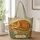 Sleeping Ginger Cat With Wildflowers For Book Lovers, Garden Gifts And Daily Errands Quilted Tote Bag - 1