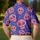 Coral Pink Skulls On Cobalt Blue For Beach Trips, Parties And Casual Streetwear Looks Men's Polo Shirt - 5