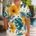 Golden Hibiscus And Teal Monstera Leaves For Beach Holidays And Resort Getaways Men Hawaiian Shirt - 1