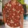 White Island Blossoms on Brick Red Ground for Beach Vacations and Summer Getaways Hawaiian Shirt - 1