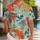 Crimson Koi Fish and Rolling Ocean Waves for Resort Evenings and Island Getaway Style Hawaiian Shirt - 1