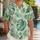 Green Tropical Leaf Couple Vacation Style for Beach Resorts and Island Getaways Together Hawaiian Shirt - 1