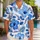 Blue Hibiscus and Tropical Leaves for Resort Getaways and Summer Vacations for Men Hawaiian Shirt - 1
