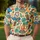 Tropical Tiki Cat Hula Drums For Hawaiian Vacations, Luau Parties And Travel Men Women Men's Polo Shirt - 4