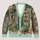 Rose-Covered Bookshop Street Scene for Cozy Autumn Reading and Cottagecore Days All-over Print Knitted Cardigan - 1