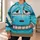 Teal Cartoon Race Car Costume Style for Halloween Parties and Racing Fan Gifts All-over Print Hoodie (Lightweight) - 6
