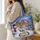 Snowman and Snowy Christmas Village for Cozy Winter Holiday Giving Quilted Tote Bag - 3