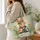 Folk Art Easter Bunny with Painted Eggs for Springtime Celebrations and Gift Giving Quilted Tote Bag - 3