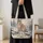 Snowy Lynx in a Pine Forest for Cozy Winter Days and Nature Lovers Quilted Tote Bag - 4