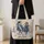 Blue Western Cowgirl Horseback Scene for Rodeo Days and Ranch Life Quilted Tote Bag - 4